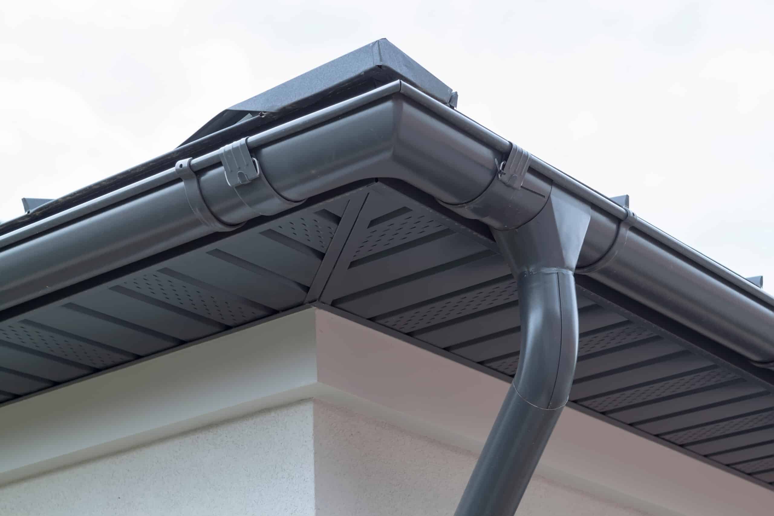 Modern house gutter system installation.
